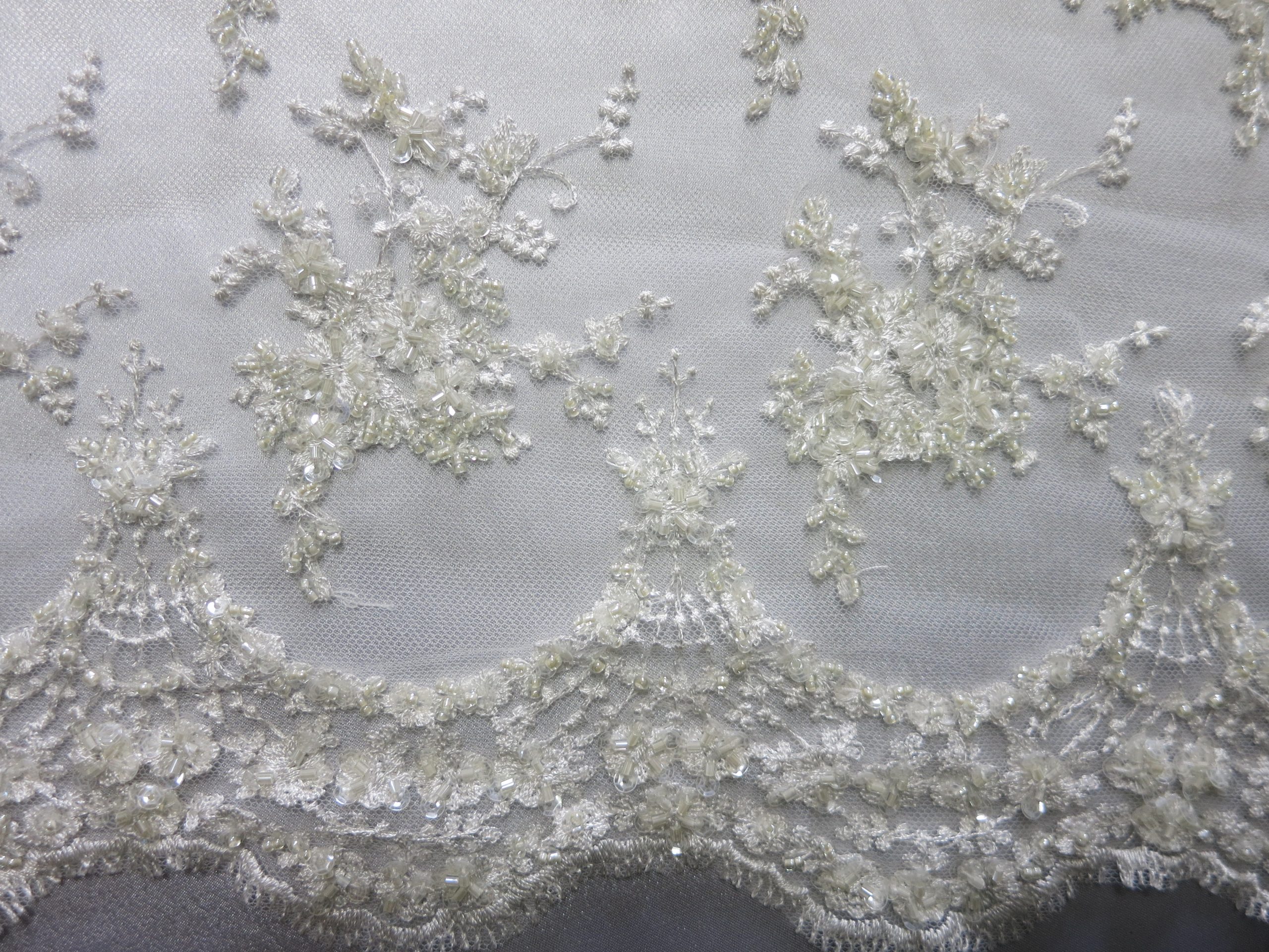 Shimmering Sequinned Off-white Grid Mesh Lace Fabric