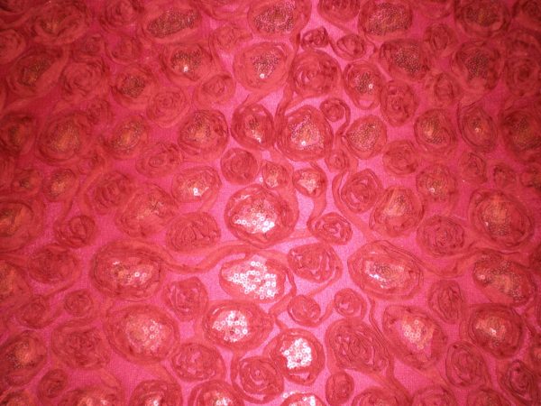 fabric with red flowers and sequins - Fabric Universe