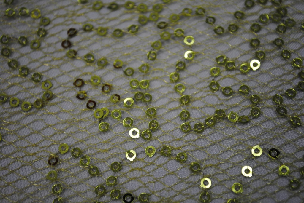 Lime sequins on spider mesh fabric - Fabric Universe