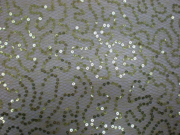 Yellow sequins on spider mesh fabric - Fabric Universe