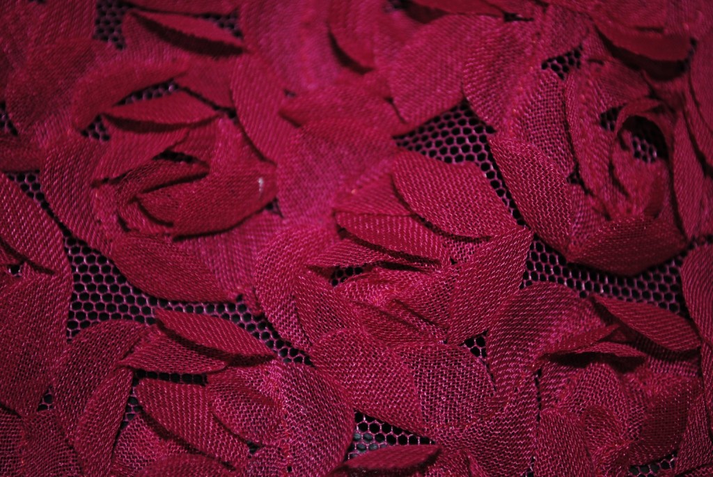 Fuchsia baby flowers on mesh ground fabric - Fabric Universe