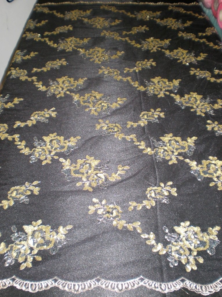 Black Flowers Made of Sequins on Mesh by Fabric Universe