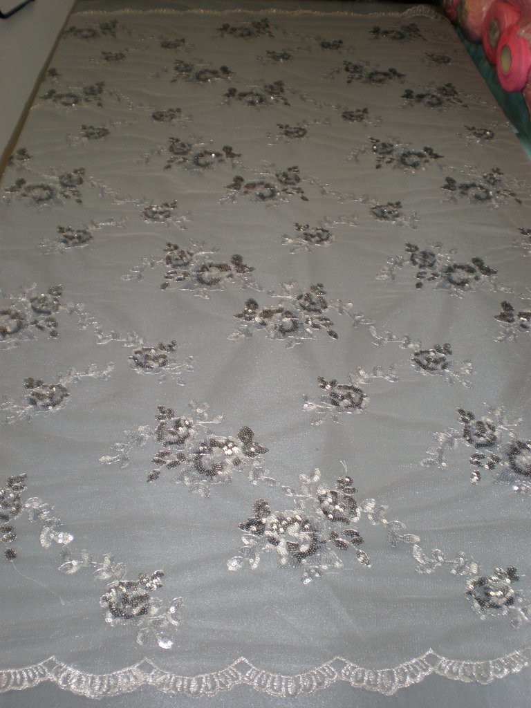 Silver Flowers Made of Sequins on Mesh by Fabric Universe